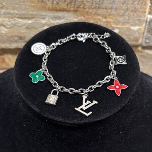 Silver-Tone Charm Bracelet with Designer. Charms & Red & Green Enamel Accents